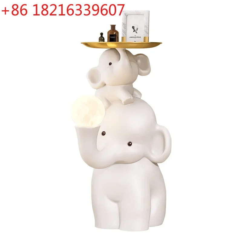 Elephant living room large floor-to-ceiling ornament TV cabinet next to the sofa bedside cartoon floor lamp