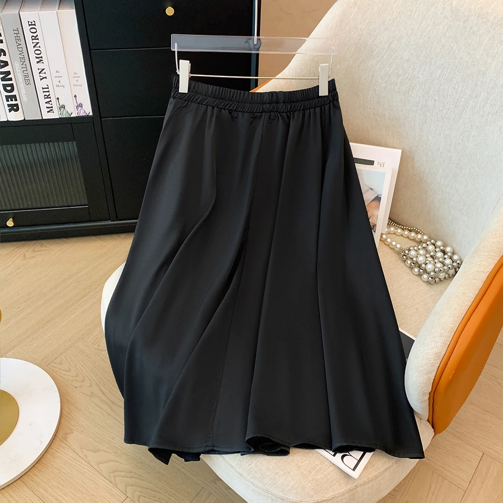 Plus-size women\'s long thin A-line skirt temperament with solid color simple black suit pleated high waist skirt 2024 fall new