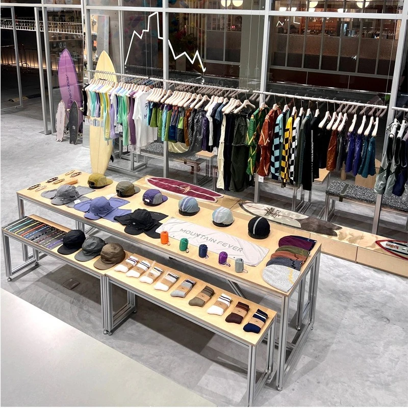 

Nordic clothing store table with Nakajima birch display table in the middle