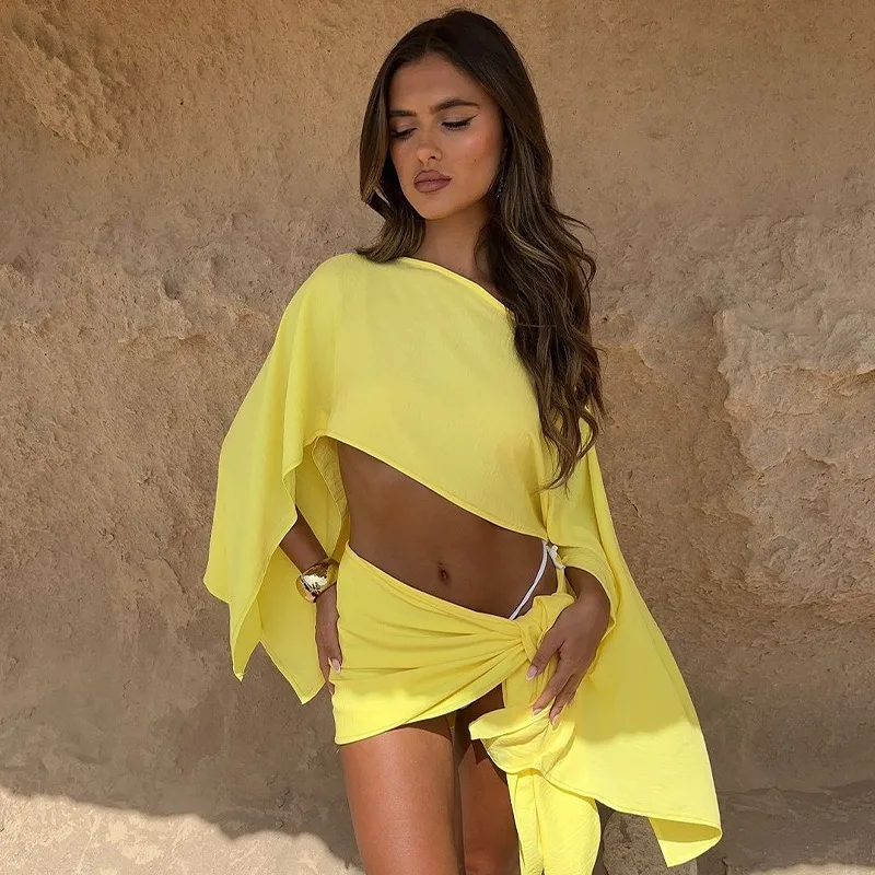 

Новая осенняя женская одежда в европейском и американском стиле для отпуска, топ на одно плечо с открытыми плечами, юбка с запахом, комплект из двух предметов для женщин