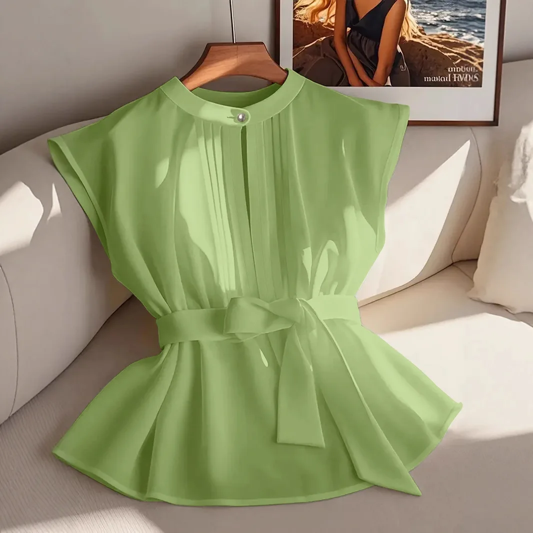 

2026 Classic Elegant Solid Color Sleeveless Belt Pleated Shirt Women's Fashion Hollow O Neck Button Female Office Shirt