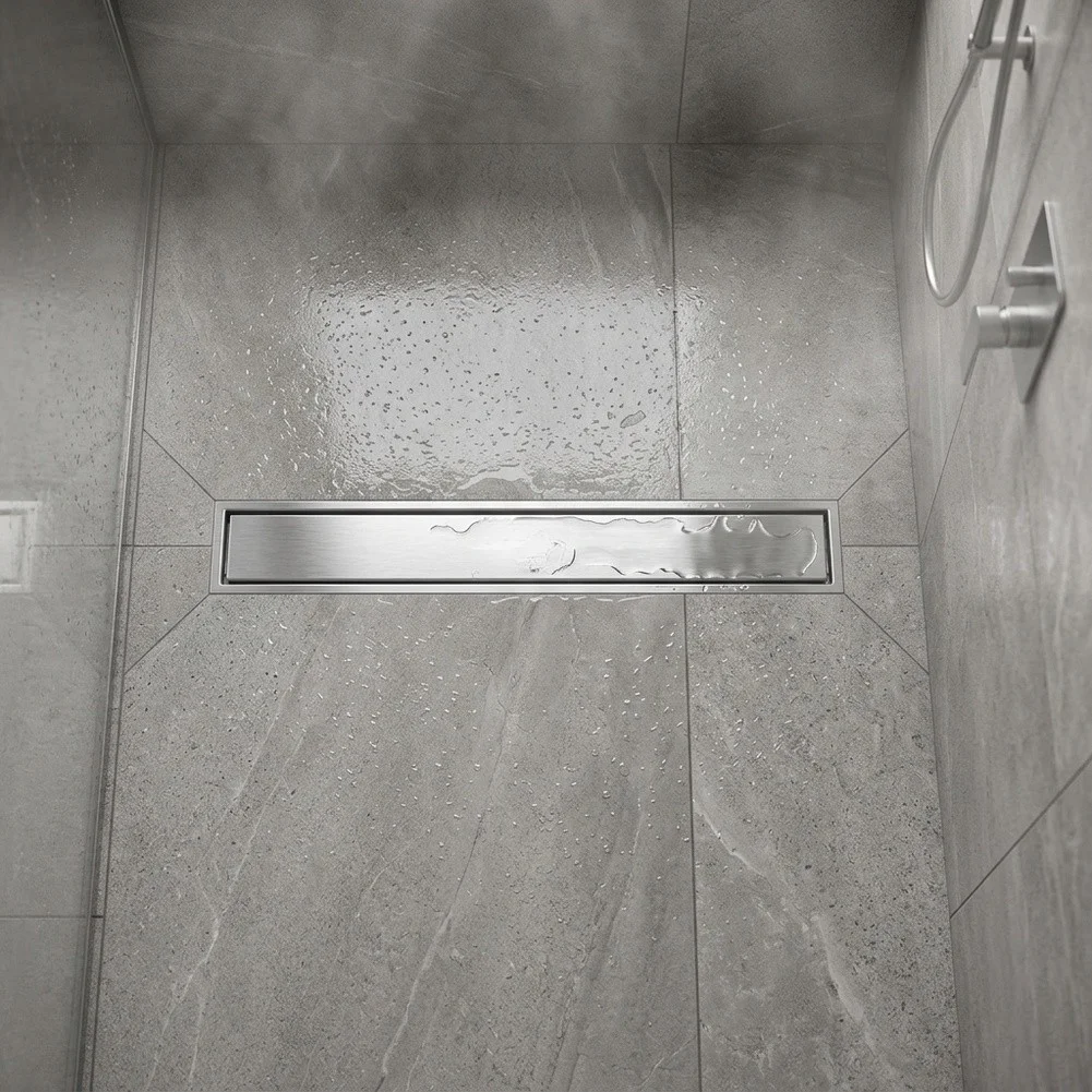 Brushed Finish Stainless Steel Shower Drain with Flat Cover and Central Drain Port for Efficient Water Evacuation in Floors