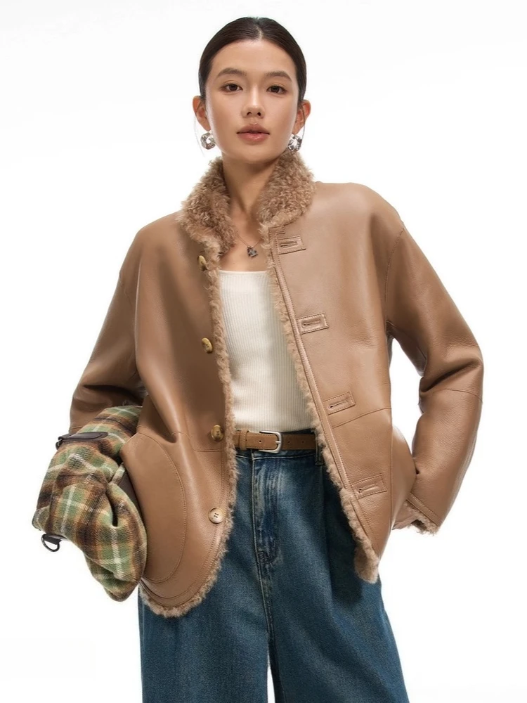 Giacche in shearling di pelliccia di agnello di lusso di fascia alta per le donne 2025 Nuovo semplice cappotto in peluche di pelliccia vera pelle a doppia faccia