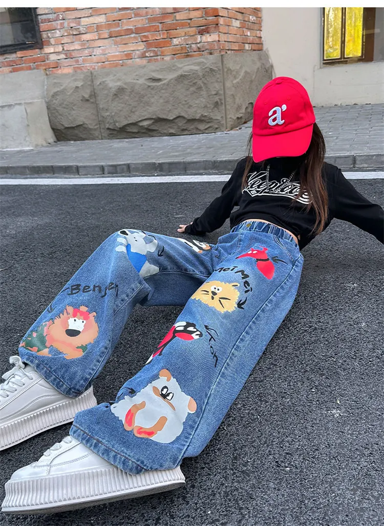 Heißer Verkauf: Blaue Jeans für Teenager-Mädchen mit Cartoon-Print, elastischem Mittelbund, lockerer Passform, Frühlingsmode, niedliche Kinderhose mit weitem Bein. – Detail 9