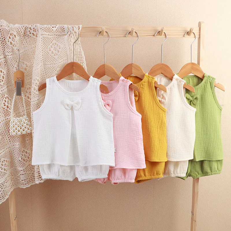 

2025 Baby bodysuit Baby girl gauze skirt set spring and summer solid color double-layer yarn breathable and comfortable girl bow