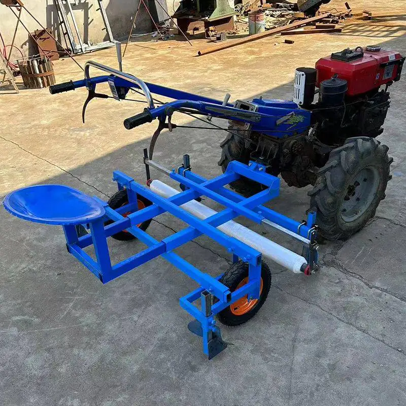 Multi-functional walk-behind tractor mulching spray shop dropper buckle film covering machine new film laminating film spreader