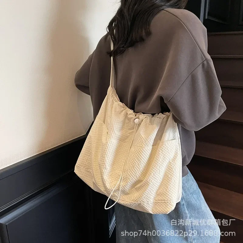 

2025 Women's Casual Drawstring Tote Bag - Lightweight Canvas Shoulder & Underarm Bag with Spacious Pockets for Work & Daily Use