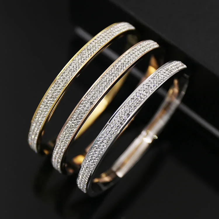 

Fashion three color exquisite sparkle OL wind three row sticky white mud drilling side opening titanium steel bracelet