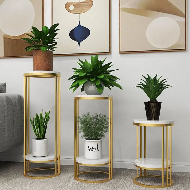

Nordic light luxury floor-to-ceiling flower stand, simple round marble shelf, green dill flower pot rack next to the TV