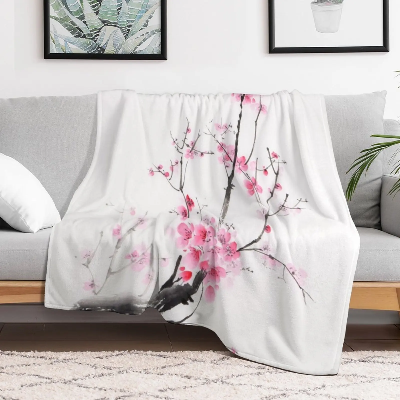 Delicate sakura branch with pink blossoms Japanese Zen sumi-e painting on white rice paper art print Throw Blanket