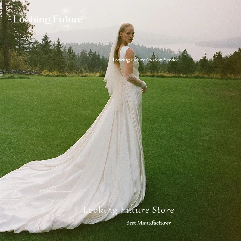 ชุดแต่งงานผ้าซาตินสีงาช้างเรียบง่ายสำหรับผู้หญิง แขนกุด คอทรงเรือ เซ็กซี่ ชายกระโปรงยาวลากพื้น ชุดเจ้าสาวเปิดหลัง แบบสั่งตัดได้