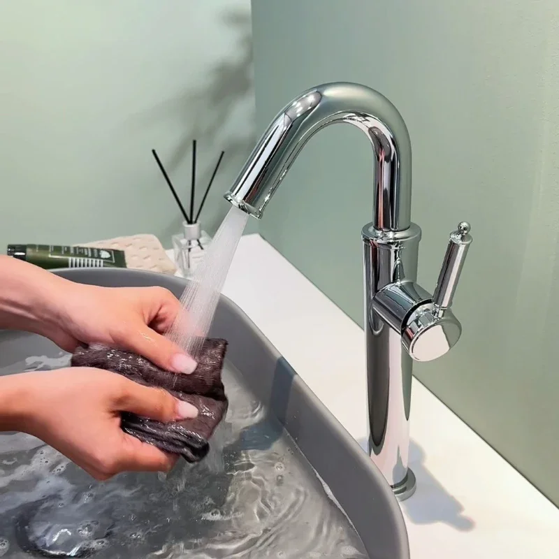 

Tall stainless steel mixer tap for countertop basins – hot and cold water – raised model for bathroom washbasins