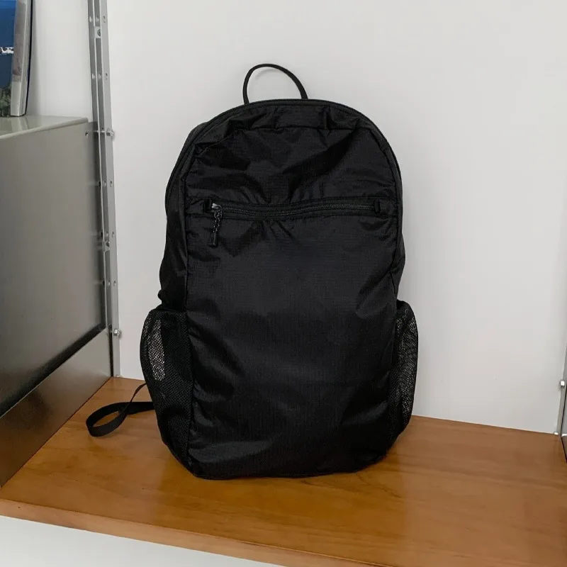 2026 autumn fashion simple 15L nylon lightweight backpack for men and women commuting waterproof travel school backpack