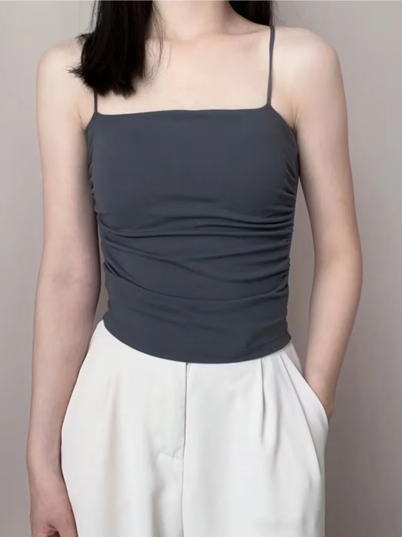 This 3-piece set of solid open-back camisoles is an essential layering staple for spring and summer. With a simple minimalist si