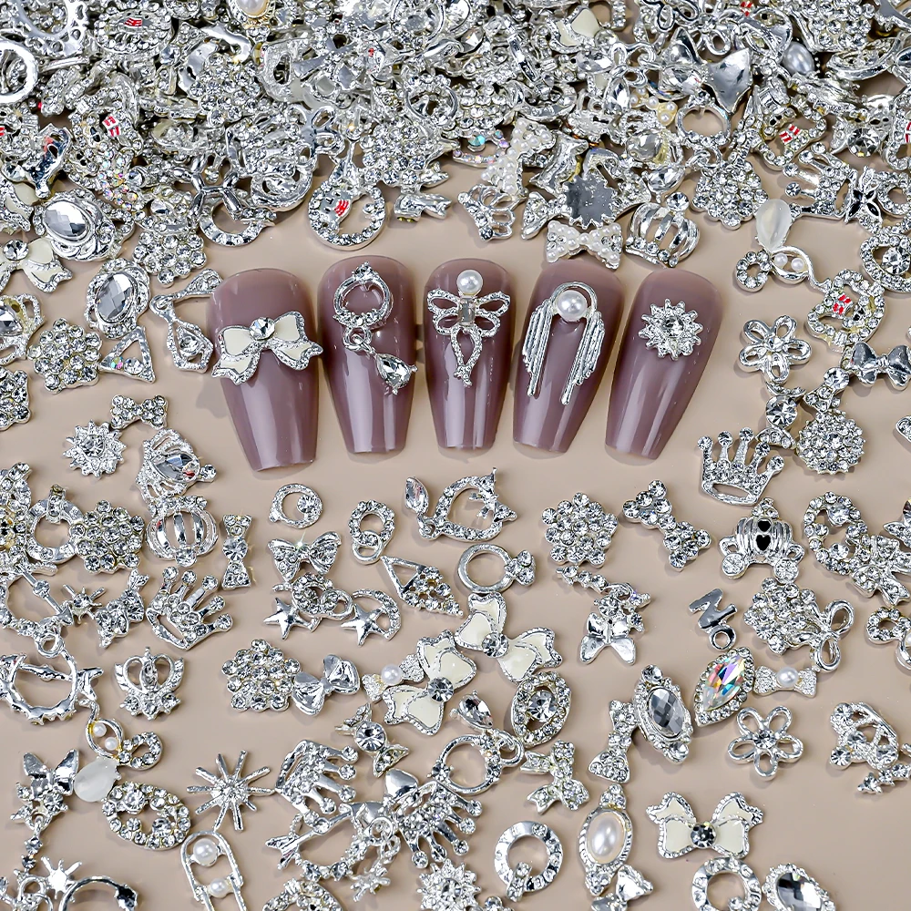 50 個 3D ランダムネイルアートチャーム混合シルバーちょう結び花文字合金リベットネイルアート装飾 DIY 工芸品マニキュアアクセサリー