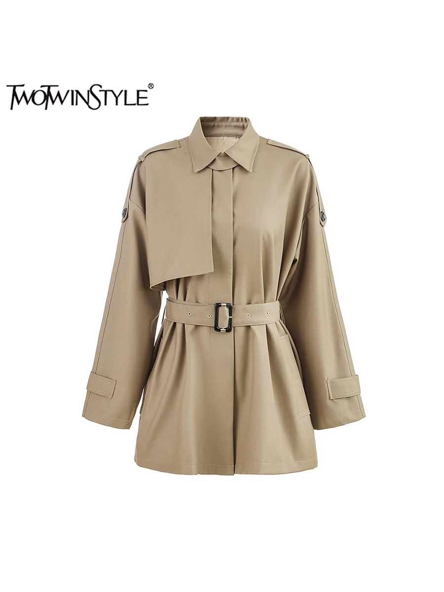 

TWOTWINSTYLE Solid Patchwork Belt Asymmetrical Trench For Women Lapel Long Sleeve Casual Loose Coats Female Fashion Clothes New