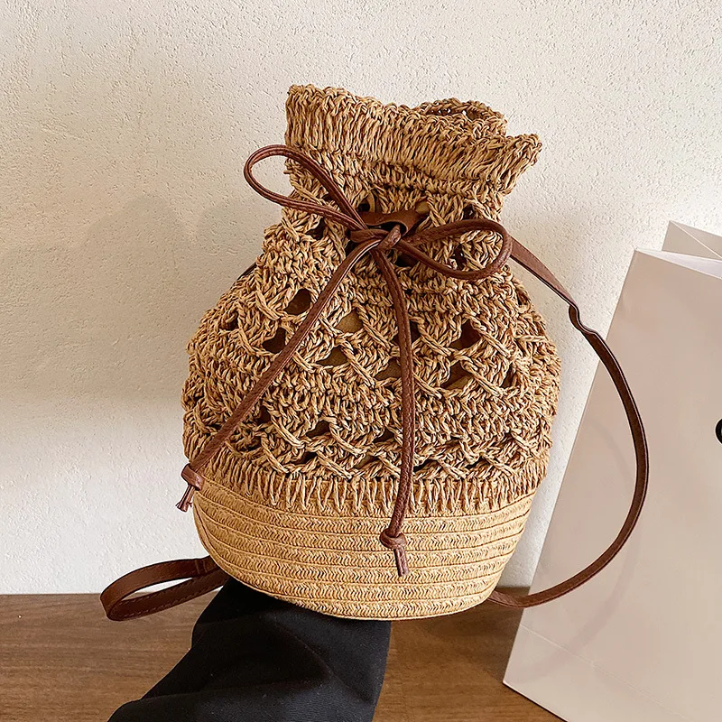 Handmade Women\'s Summer Straw Beach Shoulder Bag Woven Hollow Drawstring Shoulder Bags Knitted Fashion Female Design Travel Tote