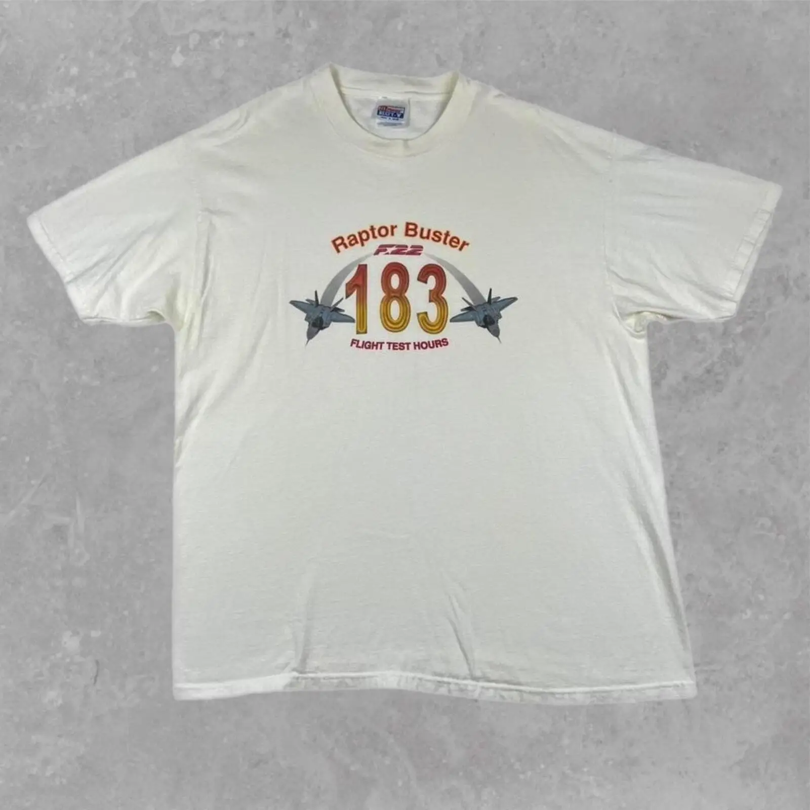 

Cream F-22 Raptor: The Balloon Buster T-shirt Size XL