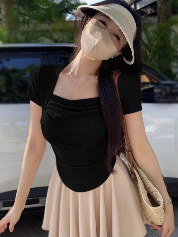 Cseta ajustada de manga corta con cuello cuad ne para mujer, Top Sexy e de verano, moda de viaje de estilo c...