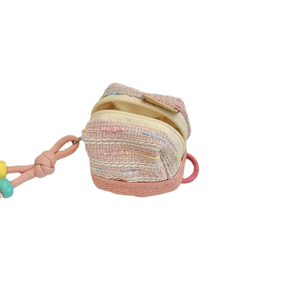 Borsa da donna Il stile carino e portatile con piccola fragranza adatta per auricolari Bluetooth Custodia in tessuto morbido di colore rosa carino per ragazza