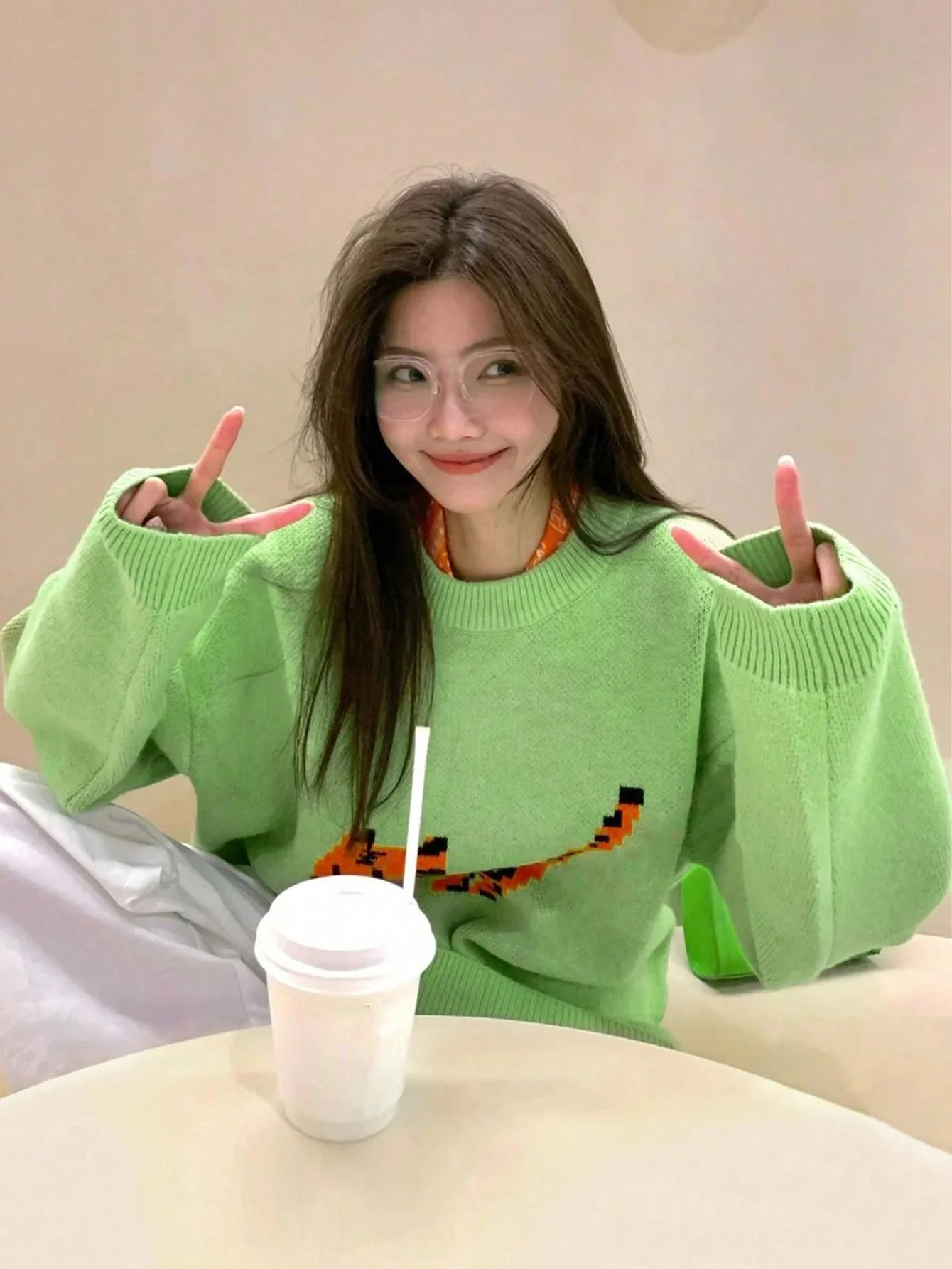 En محبوك سترة المرأة Faionable الكورية Sle الخريف الربيع الراقية الإحساس ular بلوزة جميلة للشابات