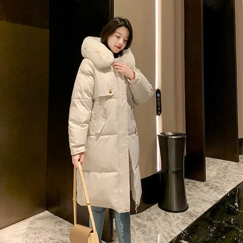 Abrigo coreano de algodón para mujer, Parkas de invierno 2025, nueva chaqueta acolchada de algodón larga y cálida, prendas de vestir con capucha, Top de moda para mujer