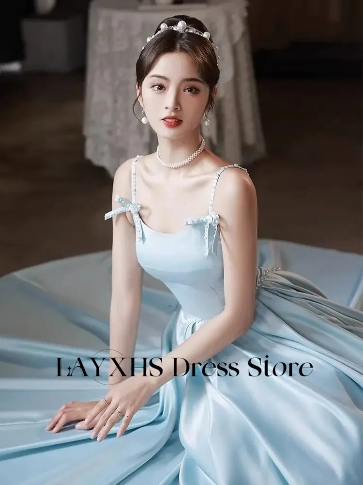 Sukienki wieczorowe LAYXHS na cienkich ramiączkach, linia A, zdobione koralikami, z kokardą na plecach, bez pleców, sukienki na studniówkę dla kobiet, szyte na miarę فساتين سهرات