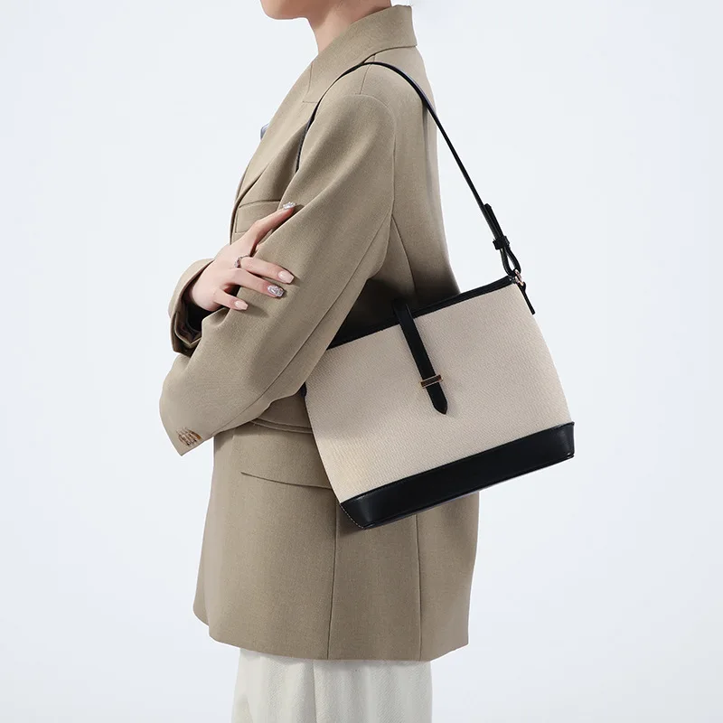 

New fashion temperament canvas bucket bag small NE style design luxury retro style women's casual handbag off-road bucket bag
