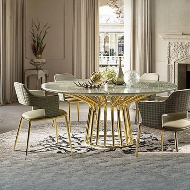 Dining table and chair combination light luxury high-end marble round table home modern high-end stainless steel dining table