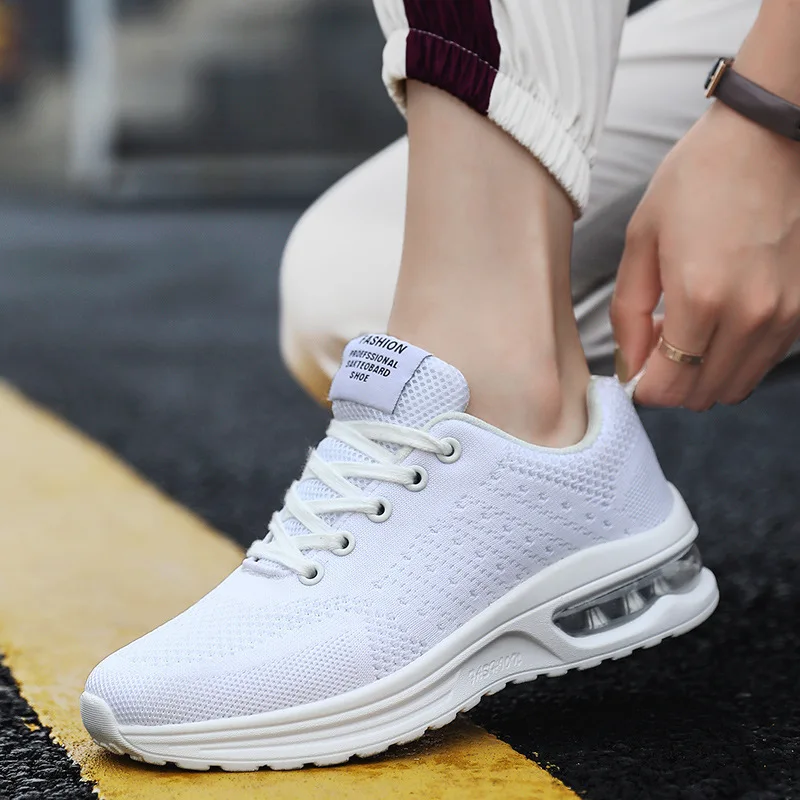 New casual fly-woven breathable and lightweight running large size air cushion shock-absorbing couple trendy sports shoes