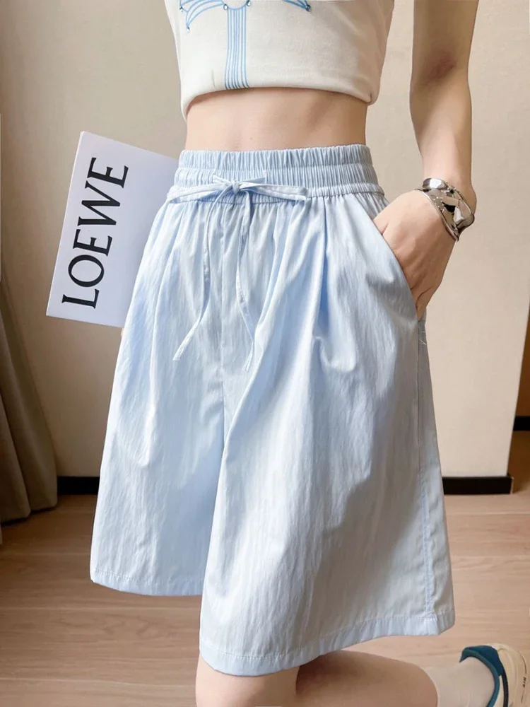 Pantaloncini al ginocchio stile college pop Vita elastica sottile Protezione solare estiva Pantaloni capri corti a gamba larga per le donne