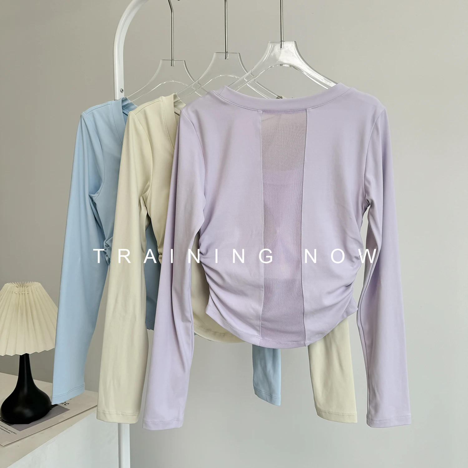 

High-end beautiful back yoga clothes for women long-sleeved sports tops with chest pads slim-fitting running Pilates fitness