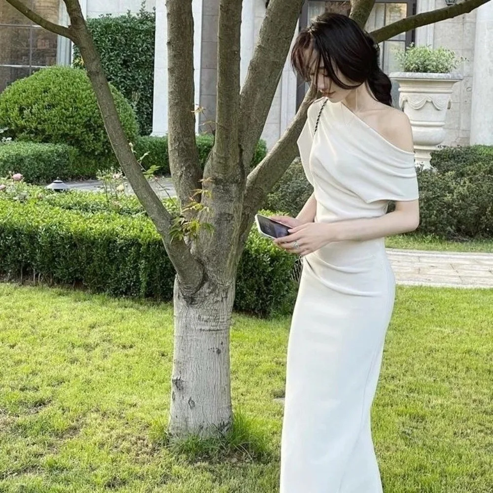 Lange schuine schouder lange jurk effen kleur off-shoulder slim fit lange rok Franse zoete beige abrikoos Koreaanse stijl jurk club
