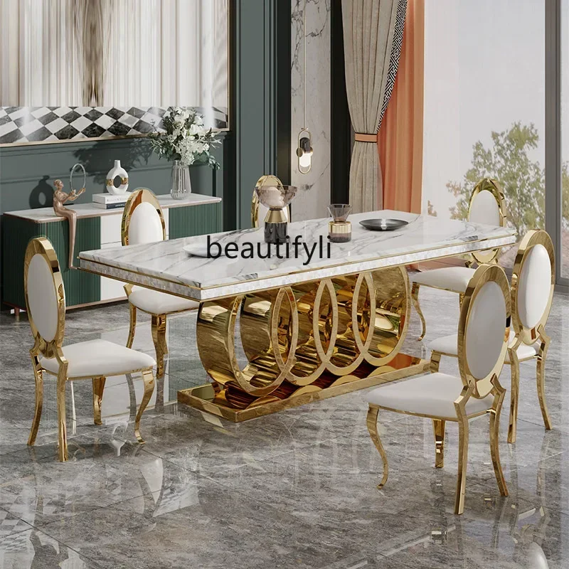 

P Light luxury stainless steel golden rock slab dining table and chair combination household villa marble dining table