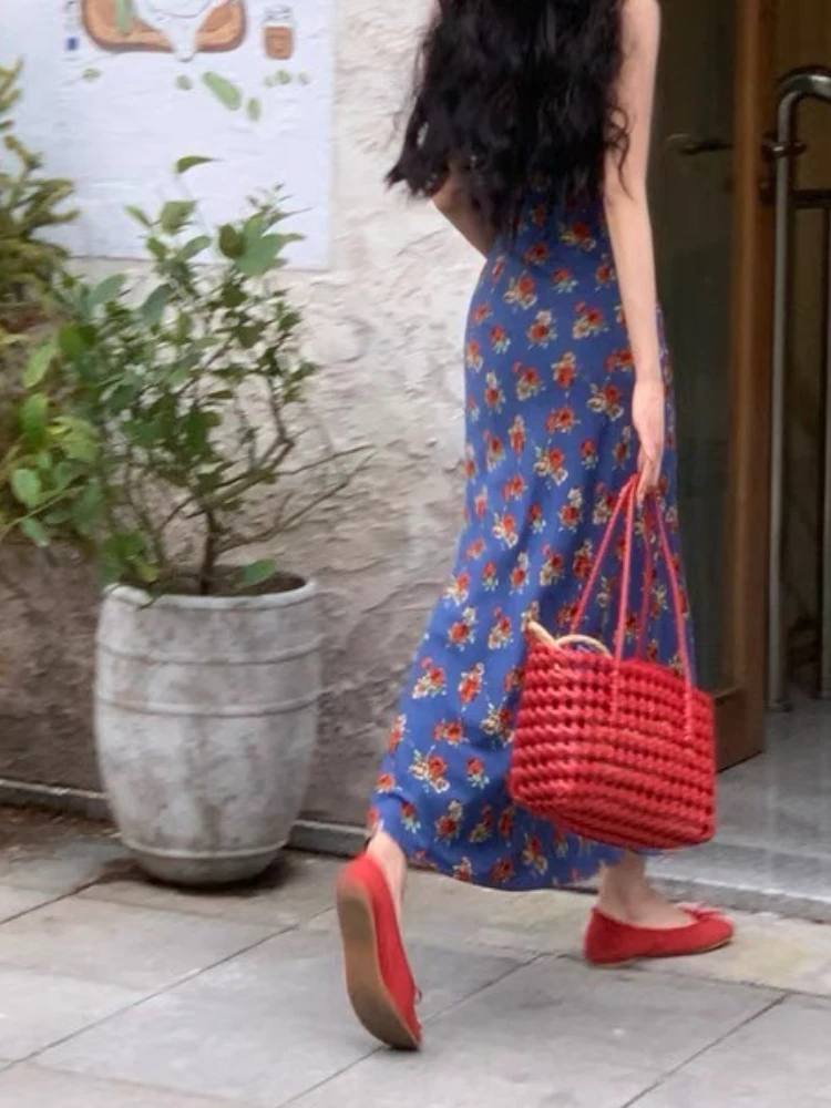 Abito floreale da donna con atmosfera di temperamento dimagrante con scollo a V blu in stile retrò Hong Kong