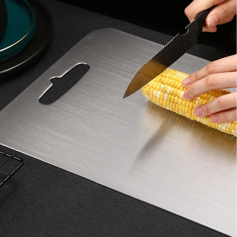 

Thick and Durable German Stainless Steel Chopping Board - Double-Sided Cutting Board for Food Preparation and Rolling