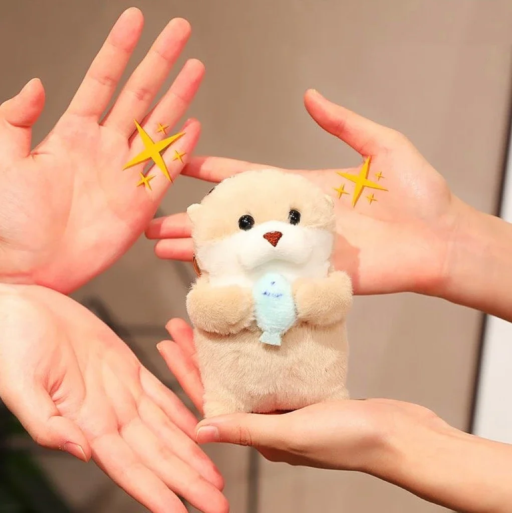 น่ารัก Otters ถือปลาตุ๊กตา Plush Keyrings น้ําหนักเบาแขวนจี้ Props สําหรับกระเป๋ากระเป๋าสตางค์ตุ๊กตาของเล่นของขวัญ 13 ซม