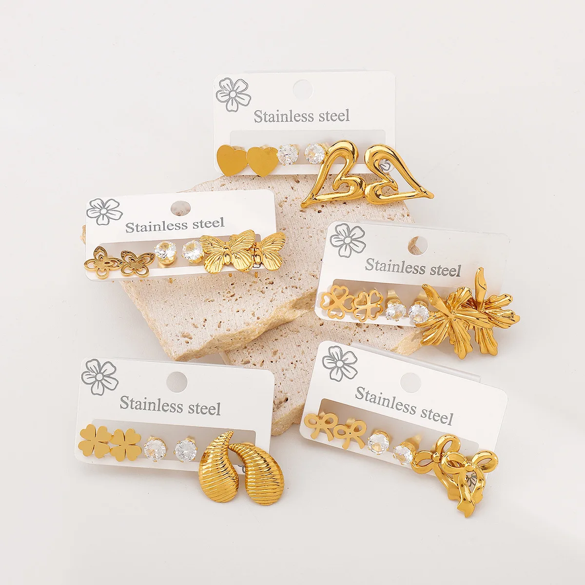 ZE1085 foreign trade stainless steel multi-element earrings set, simple and versatile love bow flower stud earrings
