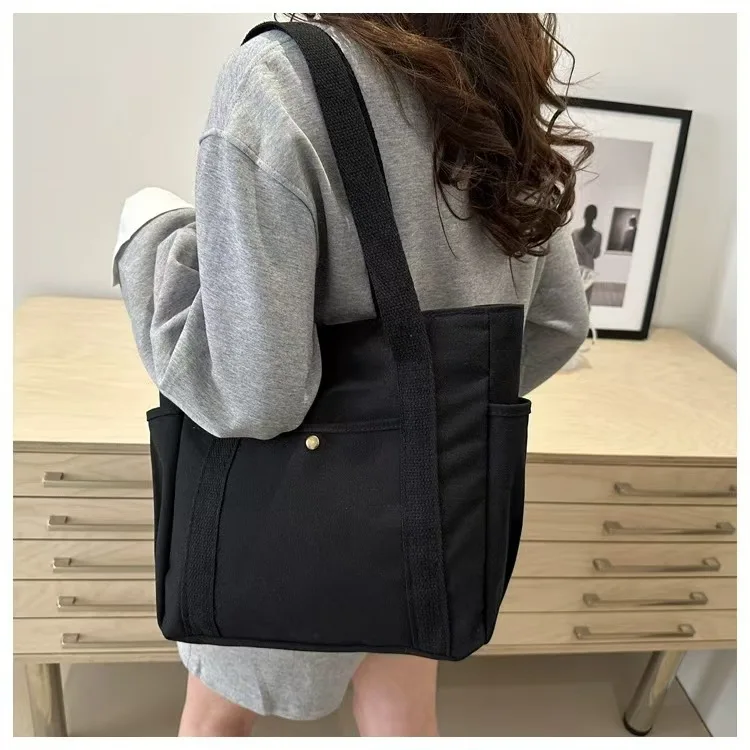 Große Canvas-Tragetasche für Arbeit und Ausgehen, Hochwertige Vielseitige Tasche für Pendler, Literarische und Künstlerische Studentenmode – Detail 12