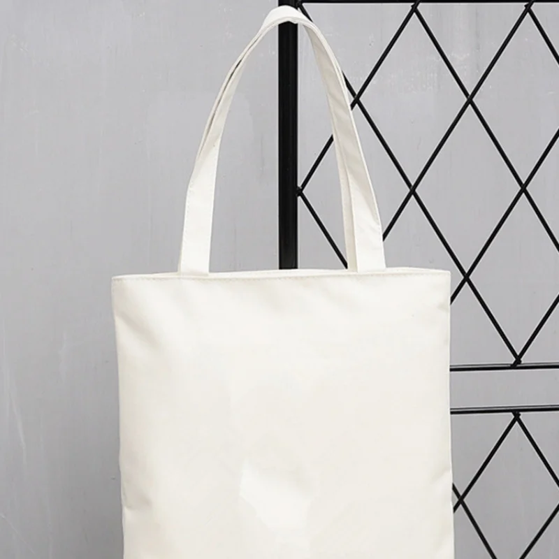 Women's canvas tote bag with strawberry pattern, casual style for summer shopping and daily use