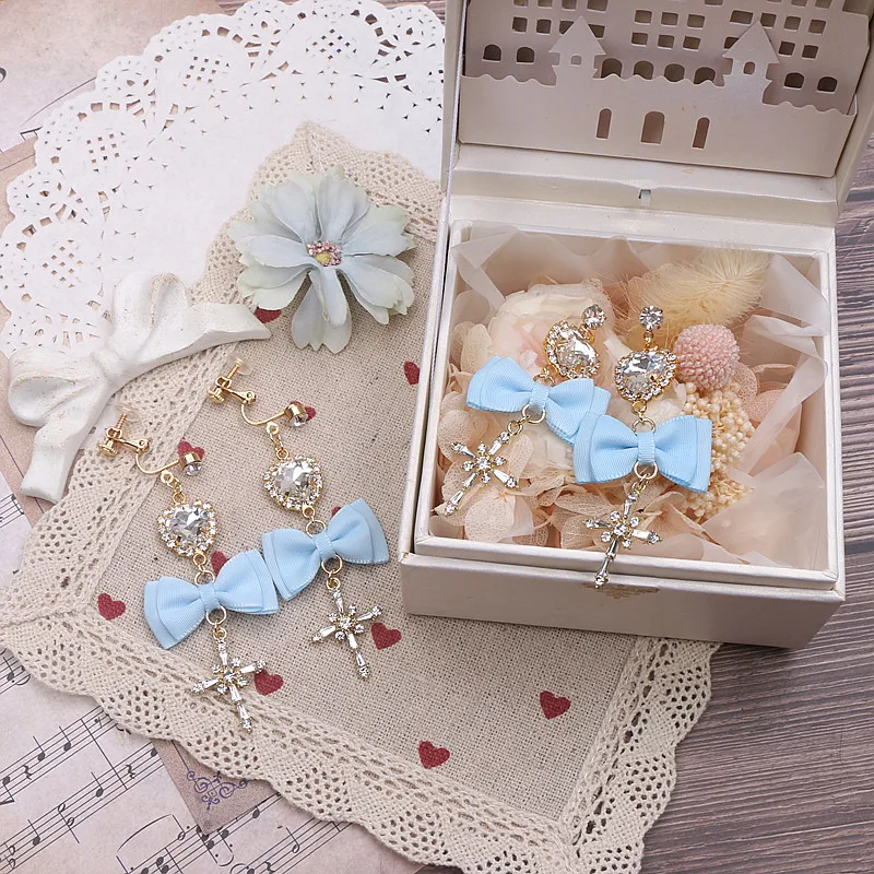 Pendientes de lazo azul claro y suave, Clips para sin piercing en la oreja, pendientes de amor cruzados con diamantes de imitación para mujer, pendientes con aguja de plata 925
