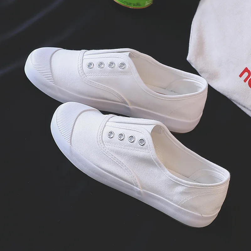 New Women's White Canvas Shoes Low Top Slip-On Breathable Flat Casual Sneakers for School Campus Daily Walking Comfort