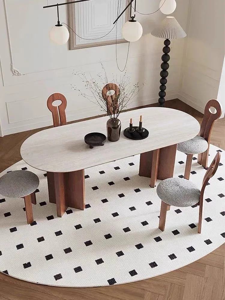 

French medieval solid wood dining table and chair combination Nordic cream style oval travertine rock slab dining table designer