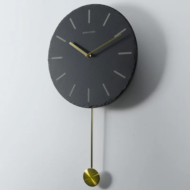 

Nordic creative home wall clock: the turn of gold and stone, natural slate stone brass scale swing clock