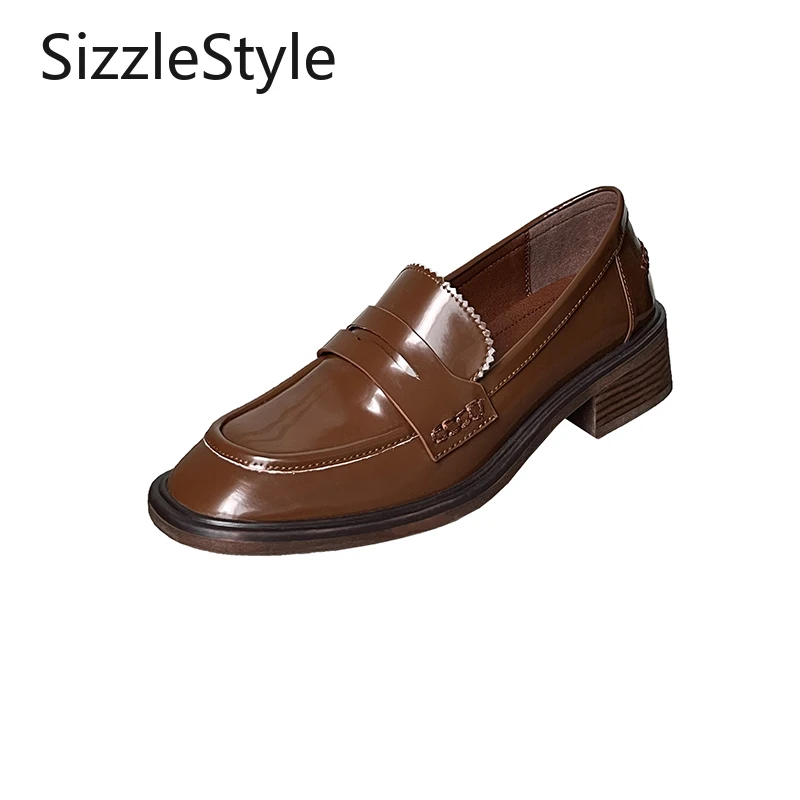 

Stylish and Simple, These Comfortable Loafers for Women Feature A Patchwork Design and A Chunky Heel.