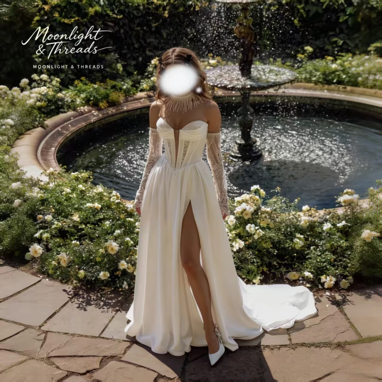 Ivory strapless sleeveless floor-length ball gown for formal weddings featuring lace gloves and a boned bodice with a slit skirt