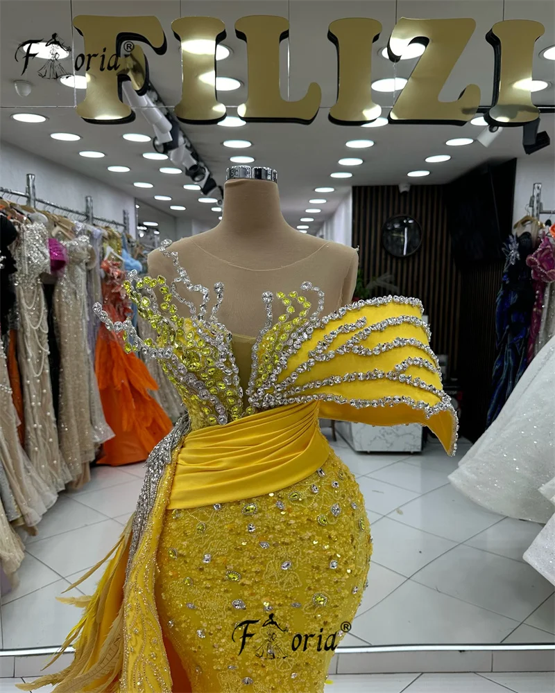 Żółta suknia ślubna Mermaid z koralikami vestidos largos de gala noche Dubai Woman Suknie ślubne Pióra Kryształowe aplikacje Formales