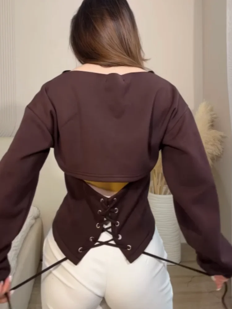 

Женская облегающая футболка с круглым вырезом и длинным рукавом, на шнуровке, однотонная, с вырезами, пуловер, новинка 2026 года, женская уличная одежда
