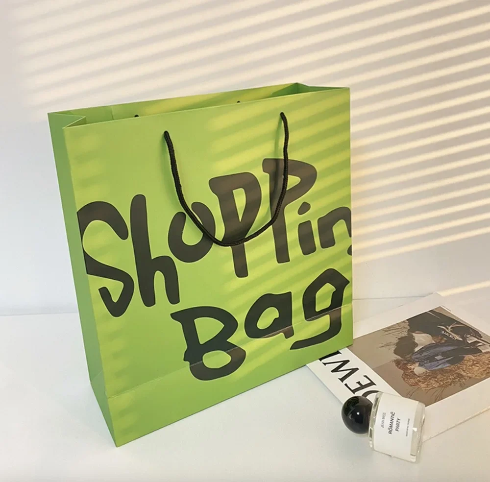 Custom Logo White Cardboard Shopping Bag Thickened High‑End Custom Gift Handbag For Clothing Store Retail Packaging