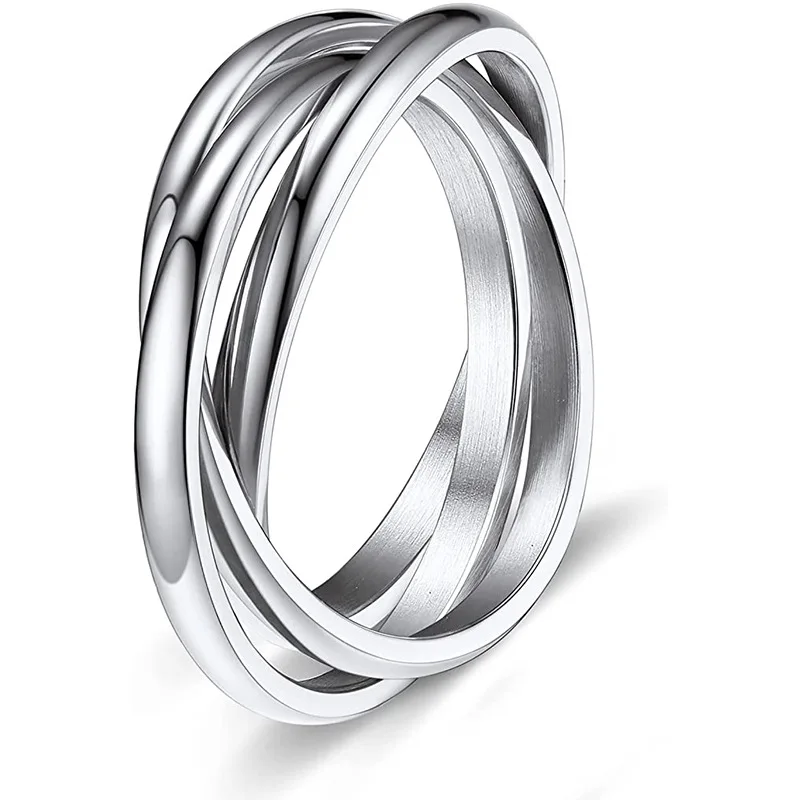 Anillos de pareja giratorios de acero inoxidable y titanio con triple anillo